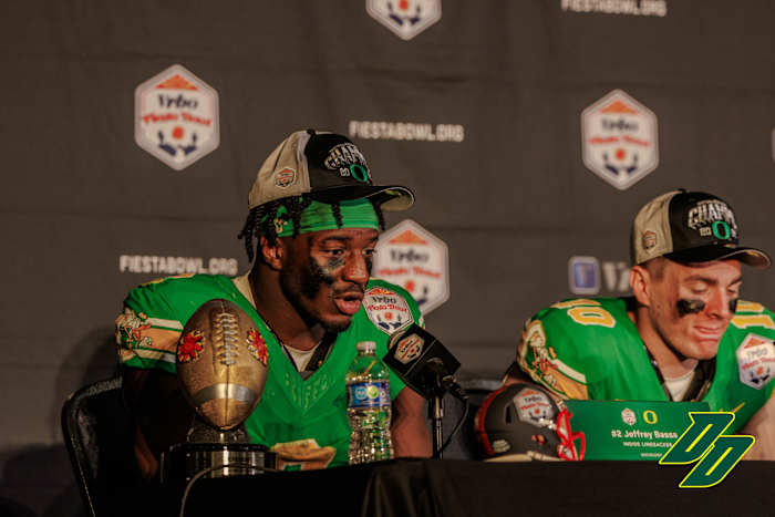 Oregon Ducks linebacker Jeffrey Bassa speaks with reporters following a 45-6 win over the Liberty Flames in the Vrbo Fiesta Bowl.